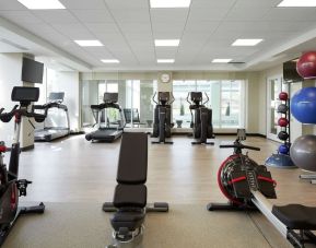 Fully equipped fitness center at DoubleTree By Hilton Montreal Airport.