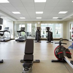 Fully equipped fitness center at DoubleTree By Hilton Montreal Airport.