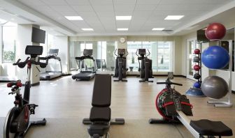 Fully equipped fitness center at DoubleTree By Hilton Montreal Airport.