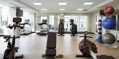 Fully equipped fitness center at DoubleTree By Hilton Montreal Airport.