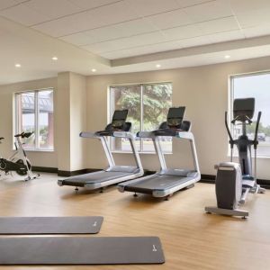 Fully equipped fitness center at the Embassy Suites by Hilton Montreal Airport.