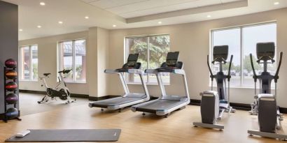 Fully equipped fitness center at the Embassy Suites by Hilton Montreal Airport.