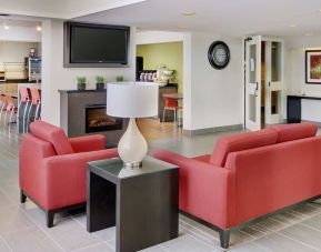 Lobby and coworking lounge at Comfort Inn Sudbury East.