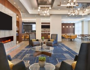 Lobby and coworking lounge at Courtyard By Marriott Kitchener.