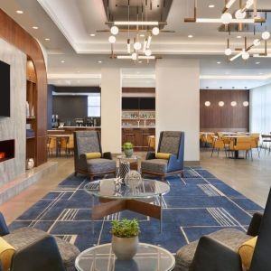 Lobby and coworking lounge at Courtyard By Marriott Kitchener.