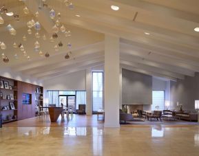 Hotel lobby with lounge area and workspace at Hilton Mississauga Meadowvale.