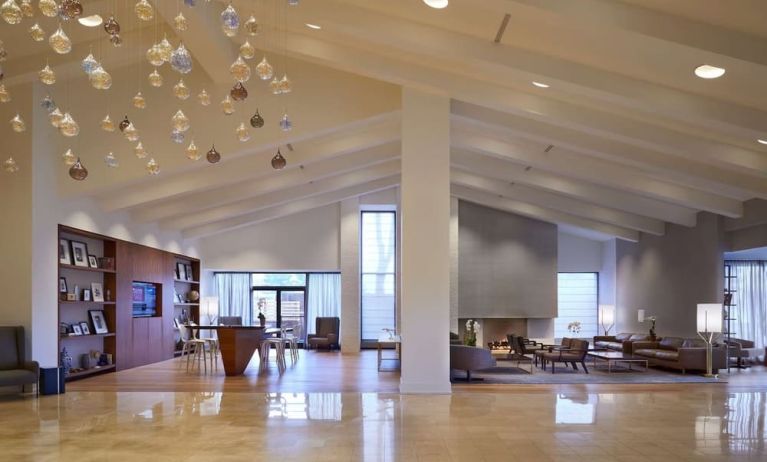 Hotel lobby with lounge area and workspace at Hilton Mississauga Meadowvale.