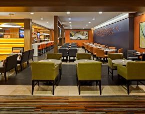 Dining area with comfortable seating at Hilton Mississauga Meadowvale.