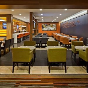 Dining area with comfortable seating at Hilton Mississauga Meadowvale.