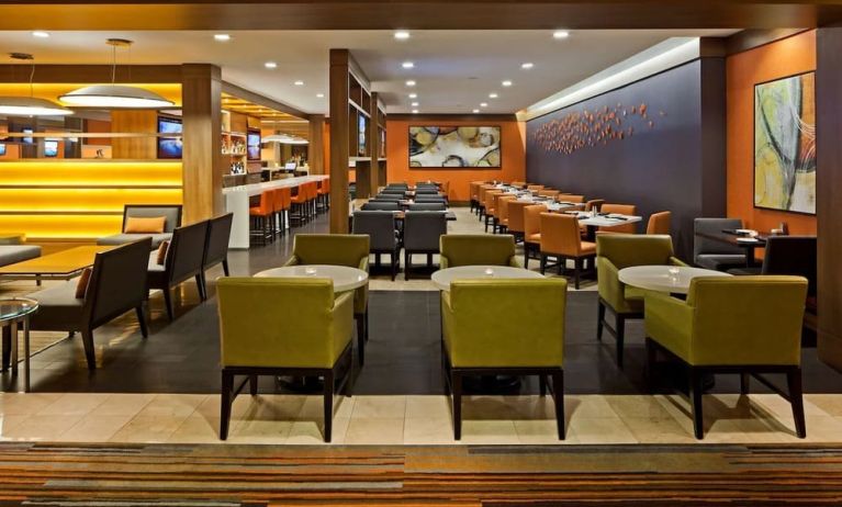 Dining area with comfortable seating at Hilton Mississauga Meadowvale.