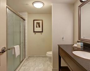 Private guest bathroom with shower at Hampton Inn By Hilton Toronto Airport Corporate Centre.