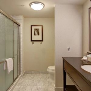 Private guest bathroom with shower at Hampton Inn By Hilton Toronto Airport Corporate Centre.