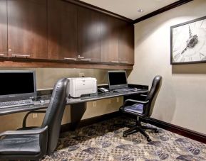 Business center with computers, printer and ergonomic chairs at Hampton Inn By Hilton Toronto Airport Corporate Centre.