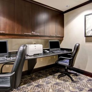 Business center with computers, printer and ergonomic chairs at Hampton Inn By Hilton Toronto Airport Corporate Centre.