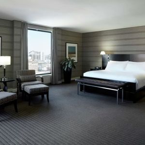 Day use room with work desk, lounge area and private bathroom at DoubleTree By Hilton Montreal.