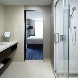 Private bathroom with shower at DoubleTree By Hilton Montreal.