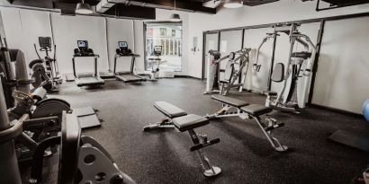 Fully equipped fitness center at DoubleTree By Hilton Montreal.