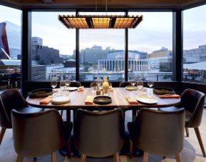 Hotel restaurant with view at DoubleTree By Hilton Montreal.