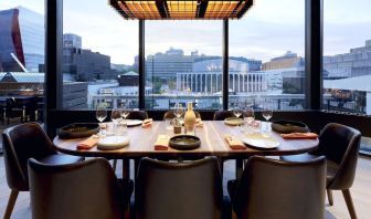 Hotel restaurant with view at DoubleTree By Hilton Montreal.