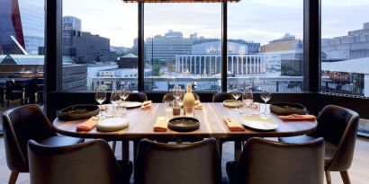 Hotel restaurant with view at DoubleTree By Hilton Montreal.