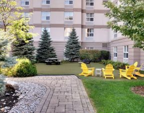 Hotel exterior patio at Homewood Suites By Hilton Toronto-Markham.