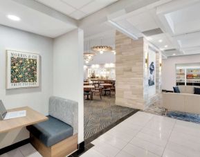 Lobby lounge area and workspace perfect for co-working at Homewood Suites By Hilton Toronto-Markham.