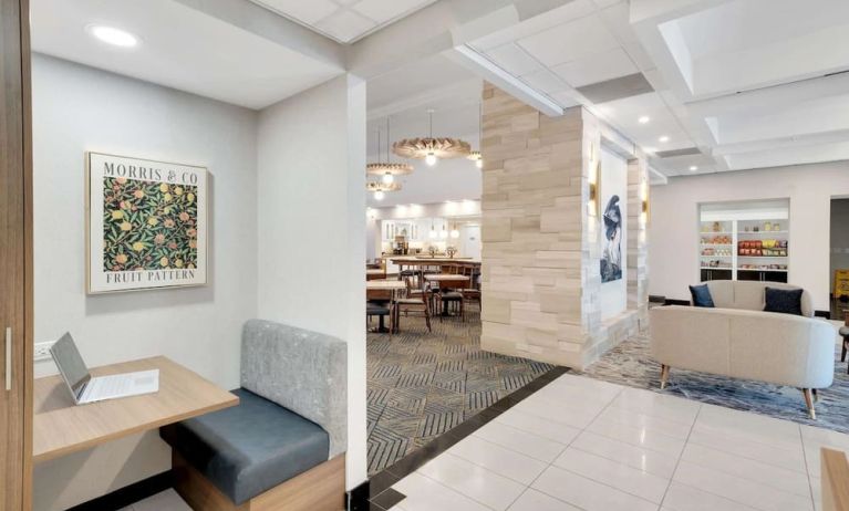 Lobby lounge area and workspace perfect for co-working at Homewood Suites By Hilton Toronto-Markham.