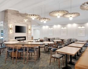 Dining area with comfortable seating, perfect for co-working at Homewood Suites By Hilton Toronto-Markham.