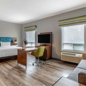 Day use studio suite with lounge area, work station and private bathroom at Hampton Inn & Suites By Hilton Edmonton/West.