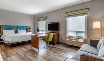 Day use studio suite with lounge area, work station and private bathroom at Hampton Inn & Suites By Hilton Edmonton/West.