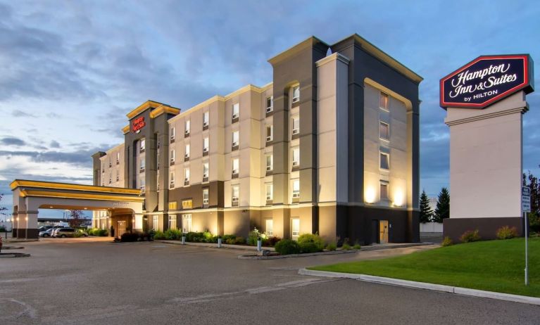 Hotel exterior and parking area at Hampton Inn & Suites By Hilton Edmonton/West.