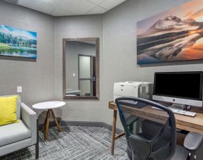 Business center with computer, printer, phone and comfortable mobiliary at Hampton Inn & Suites By Hilton Edmonton/West.