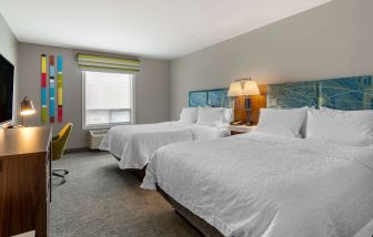 Day use twin room with TV, work desk and private bathroom at Hampton Inn & Suites By Hilton Edmonton/West.