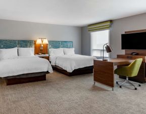 Day use twin suite with work station, lounge area and private bathroom at Hampton Inn & Suites By Hilton Edmonton/West.