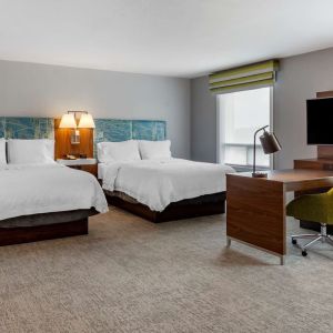 Day use twin suite with work station, lounge area and private bathroom at Hampton Inn & Suites By Hilton Edmonton/West.