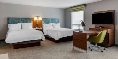 Day use twin suite with work station, lounge area and private bathroom at Hampton Inn & Suites By Hilton Edmonton/West.