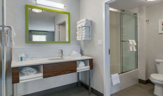 Private bathroom with shower and free toiletries at Hampton Inn & Suites By Hilton Edmonton/West.