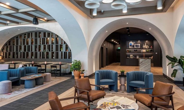 Comfortable hotel lobby perfect for co-working at The Westley Calgary Downtown, Tapestry Collection By Hilton.