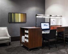 Business center with computer and printer at Hilton Winnipeg Airport Suites.