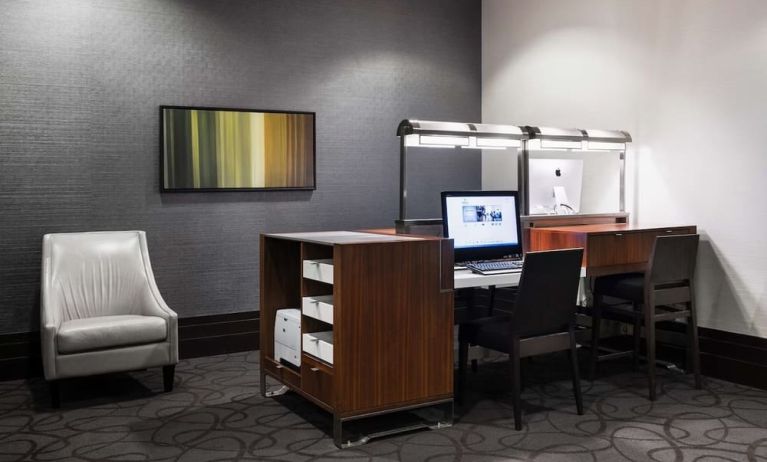 Business center with computer and printer at Hilton Winnipeg Airport Suites.