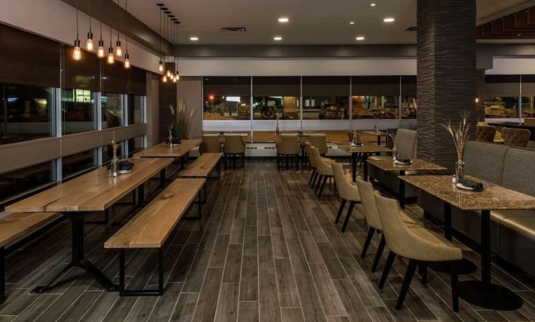 Hotel dining area at Hilton Winnipeg Airport Suites.