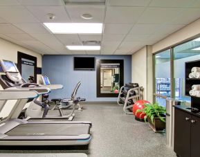 Fully equipped fitness center at the  Hampton Inn & Suites By Hilton Guelph.