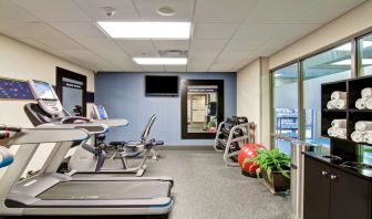 Fully equipped fitness center at the  Hampton Inn & Suites By Hilton Guelph.