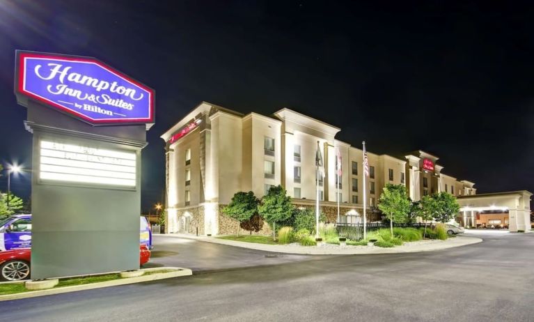 Hotel exterior and parking area at the  Hampton Inn & Suites By Hilton Guelph.