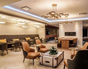 Dining area with comfortable seating, perfect for co-working at DoubleTree By Hilton Kitchener.