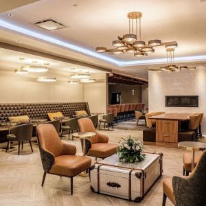 Dining area with comfortable seating, perfect for co-working at DoubleTree By Hilton Kitchener.