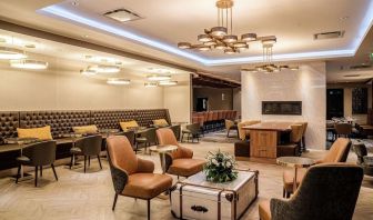 Dining area with comfortable seating, perfect for co-working at DoubleTree By Hilton Kitchener.