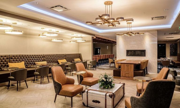 Dining area with comfortable seating, perfect for co-working at DoubleTree By Hilton Kitchener.