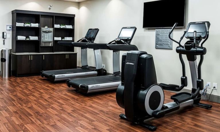 Fitness center with treadmills and machines  at DoubleTree By Hilton Kitchener.