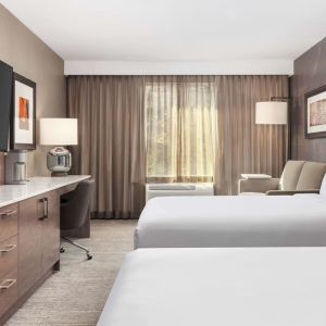 Twin day use room with TV, work desk and private bathroom  at DoubleTree By Hilton Kitchener.